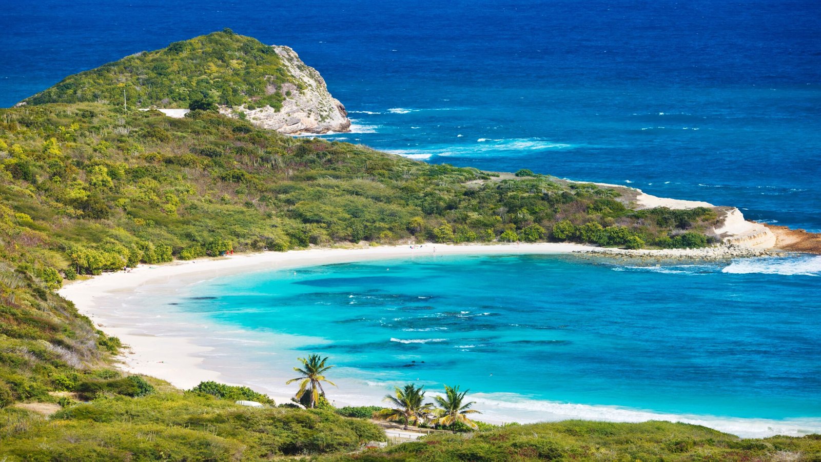 The beautiful Half Moon Bay in Antigua from above