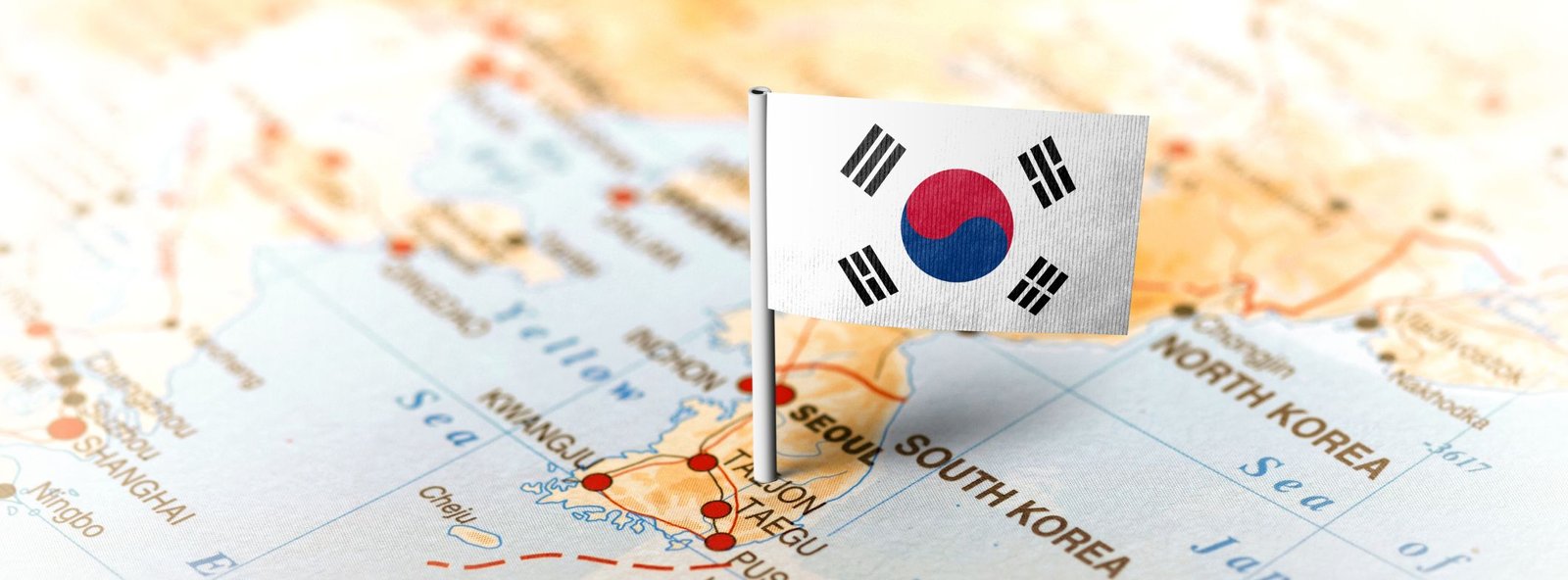 Map of South Korea with it's mini flag pinned on it