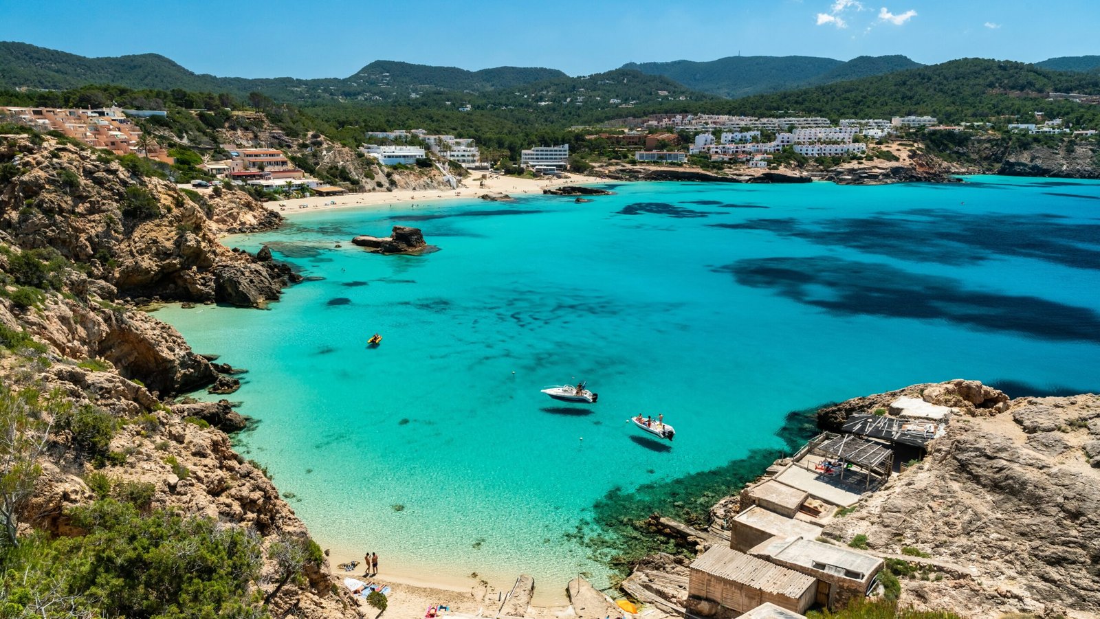 Boats in turquoise waters of Ibiza