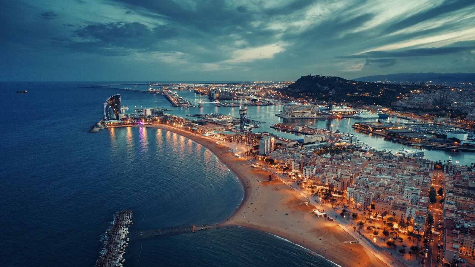 Aerial view of Barcelona Coast, Spain at night